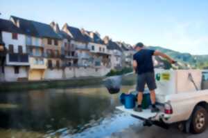 photo Lâcher de truites - Plan d'eau de la Vignotte à Sainte-Geneviève-sur Argence