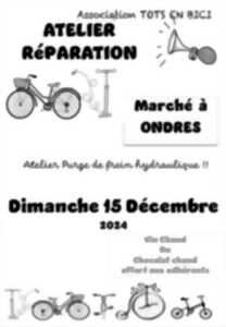 photo Atelier réparation de vélo et vin chaud